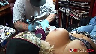 Shyla Stylez gets tattooed while playing with her bosom